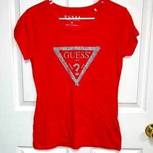 NWOT GUESS size Medium deep coral T shirt with silver glitter GUESS logo.